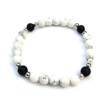 Handmade Serenity Bracelet – Howlite & Lava Stone Grounding & Calming on white table